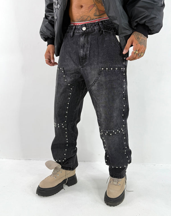 Jeans con borchie