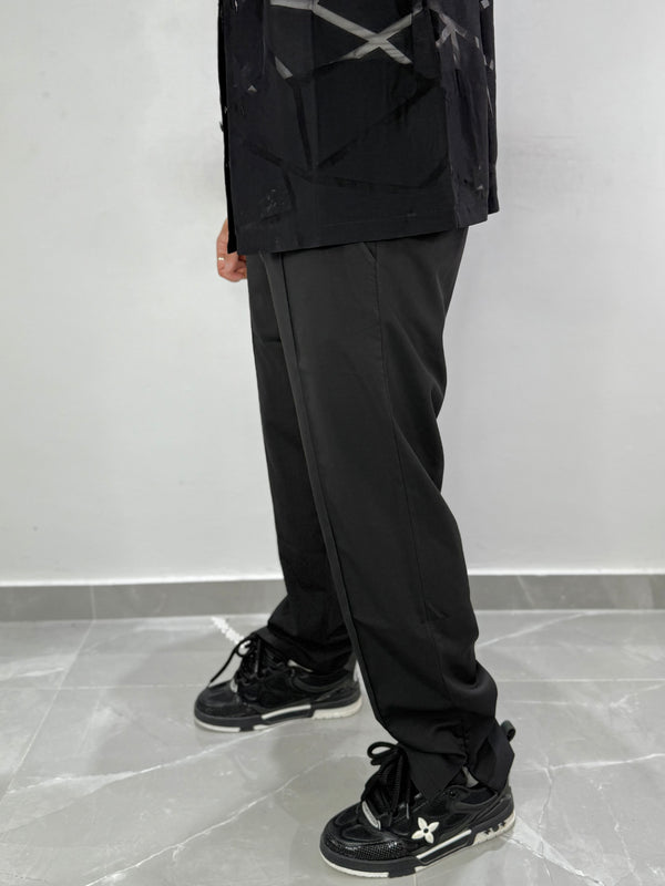 Pantalone con zip alla caviglia